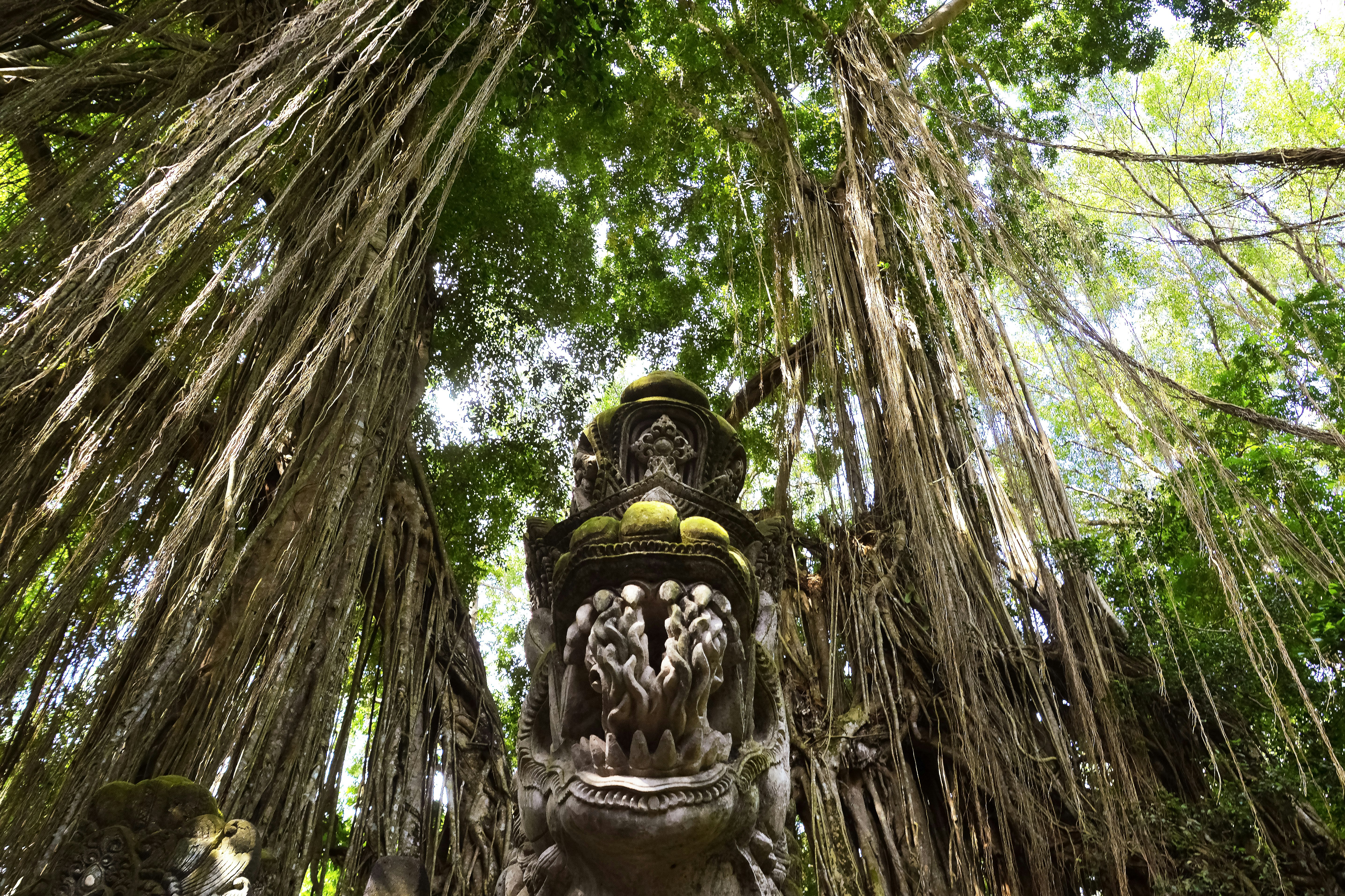 gold and green hindu deity statue